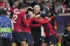 Lille's players and head coach Bruno Genesio celebrate after their fourth goal during the Champions League opening phase soccer match between Lille and Feyenoord at the Stade Pierre Mauroy in Villeneuve-d'Ascq, outside Lille, northern France, Wednesday, Jan. 29, 2025. (AP Photo/Michel Euler)