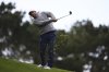 Scottie Scheffler hits from the 10th fairway at Spyglass Hill Golf Course during the first round of the AT&T Pebble Beach Pro-Am golf tournament, Thursday, Jan. 30, 2025, in Pebble Beach, Calif. (AP Photo/Nic Coury)