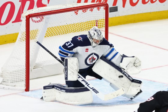 With his next victory, Connor Hellebuyck will become the 30th goaltender in NHL history to have at least 300 wins and 40 shutouts. (Jeffrey T. Barnes / Associated Press files)