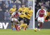 Arsenal's Myles Lewis-Skelly fouls Wolverhampton Wanderers' Matt Doherty leading to a a red card during the English Premier League soccer match at Molineux Stadium, Wolverhampton, England, Saturday Jan. 25, 2025. (Nick Potts/PA via AP)