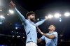 Manchester City's Josko Gvardiol, left, celebrates after his cross led to an own goal during the Champions League opening phase soccer match between Manchester City and Club Brugge at the Etihad Stadium in Manchester, Wednesday, Jan. 29, 2025. (Mike Egerton/PA via AP)
