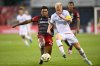 Forge FC midfielder Kyle Bekker (10) and Toronto FC midfielder Kosi Thompson (47) vie for the ball during first half Canadian Championship action in Toronto on Tuesday, August 27, 2024. THE CANADIAN PRESS/Christopher Katsarov