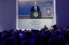 Attendees listen to a virtual speech delivered by U.S. President Donald Trump at the annual meeting of the World Economic Forum in Davos, Switzerland on Thursday, Jan. 23, 2025. THE CANADIAN PRESS/AP-Markus Schreiber