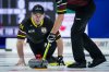 New Brunswick skip James Grattan watches his shot while playing Newfoundland and Labrador during the Brier, in Regina, Thursday, March 7, 2024. THE CANADIAN PRESS/Darryl Dyck