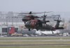 FILE - Two Sikorsky UH-60 