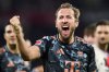 Munich's Harry Kane celebrates after the Bundesliga soccer match between SC Freiburg and Bayern Munich at Europa-Park Stadium, Freiburg, Germany, Saturday Jan. 25, 2025. (Tom Weller/dpa via AP)