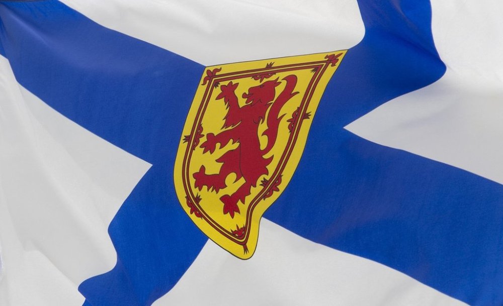 Nova Scotia's provincial flag flies on a flag pole in Ottawa, July 3, 2020. THE CANADIAN PRESS/Adrian Wyld