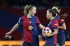 FILE - Barcelona's Keira Walsh, left, congratulates Claudia Pina after scoring during the women's Champions League group D soccer match between FC Barcelona and Manchester City at the Olympic Stadium in Barcelona, Spain, Dec. 18, 2024. (AP Photo/Joan Monfort, File)