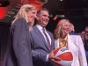 From left, WNBA Commissioner Cathy Engelbert, Alex Bhathal and Lisa Bhathal Merage appear at an event to award Portland a WNBA franchise at the Moda Center on Sept. 18, 2024, at the Moda Center in Portland. (AP Photo/Anne M. Peterson)