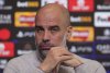 Manchester City manager Pep Guardiola reacts during a press conference at the City Football Academy in Manchester, England, Tuesday Jan. 28, 2025. (Martin Rickett/PA via AP)