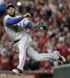 FILE - Texas Rangers' Elvis Andrus makes a play on a ball during the seventh inning of Game 7 of baseball's World Series against the St. Louis Cardinals, Oct. 28, 2011, in St. Louis. (AP Photo/Charlie Riedel, file)