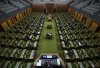 The federal Conservatives and New Democrats say the government needs to recall Parliament within the next month to act on the tariff threat from the U.S. An overall view of the House of Commons on Parliament Hill in Ottawa is shown on Saturday, April 11, 2020. THE CANADIAN PRESS/Justin Tang