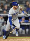 FILE - Kansas City Royals outfielder Tommy Pham (22) heads for first base on an RBI single against the New York Yankees during the fourth inning of Game 2 of the American League baseball playoff series, Oct. 7, 2024, in New York. (AP Photo/Frank Franklin II, File)