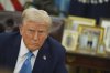 President Donald Trump speaks to reporters as he signs executive orders in the Oval Office of the White House, in Washington, Friday, Jan. 31, 2025. THE CANADIAN PRESS/AP-Evan Vucci