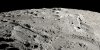 This image provided by NASA shows a view from orbit looking obliquely across the surface of the moon, where an ancient asteroid strike carved out a pair of grand canyons on the moon’s far side. (Ernie T. Wright/NASA via AP)