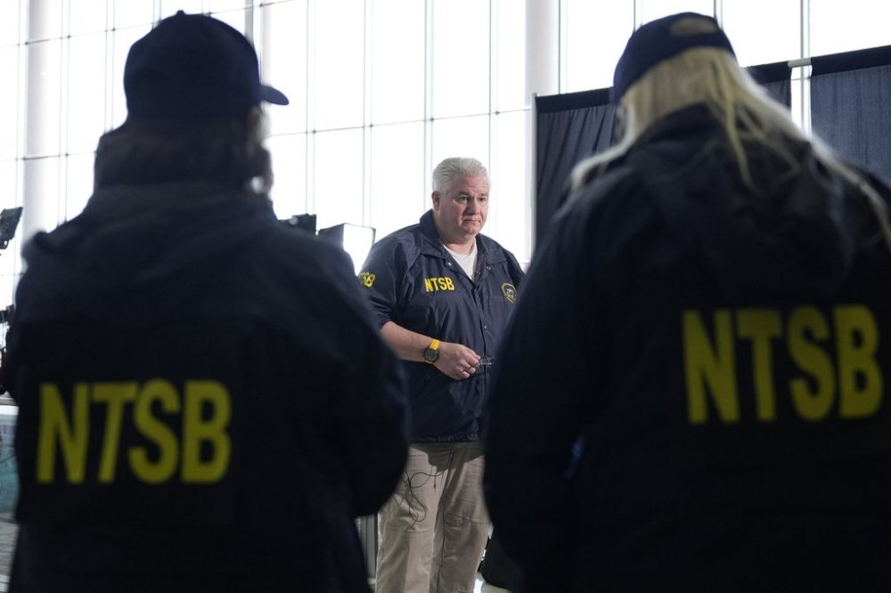National Transportation Safety Board member Todd Inman speaks with reporters at Ronald Reagan Washington National Airport, Friday, Jan. 31, 2025, in Arlington, Va. (AP Photo/Alex Brandon)