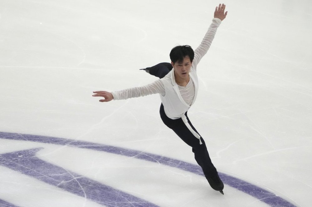 Adam Siao Him Fa of France performs during the men's short program at the ISU European Figure Skating Championships in Tallinn, Estonia, Thursday, Jan. 30, 2025. (AP Photo/Sergei Grits)