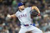 Texas Rangers starter Max Scherzer delivers a pitch during a baseball game against the Seattle Mariners in Seattle on September 14, 2024. THE CANADIAN PRESS/AP, Stephen Brashear