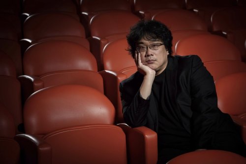 FILE - Filmmaker Bong Joon-Ho poses at the Whitby Hotel screening room in New York to promote his film 