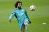 FILE - Real Madrid's Marcelo controls the ball during a training session ahead of Wednesday's Champions League first-leg quarterfinal soccer match between Chelsea and Real Madrid at Stamford Bridge stadium in London Tuesday, April 5, 2022. (AP Photo/Kirsty Wigglesworth, File)
