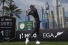 Tom Mckibbin of Northern Ireland hits off the first tee during the final round of the Dubai Desert Classic golf tournament, in Dubai, United Arab Emirates, Sunday, Jan. 19, 2025. (AP Photo/Altaf Qadri)