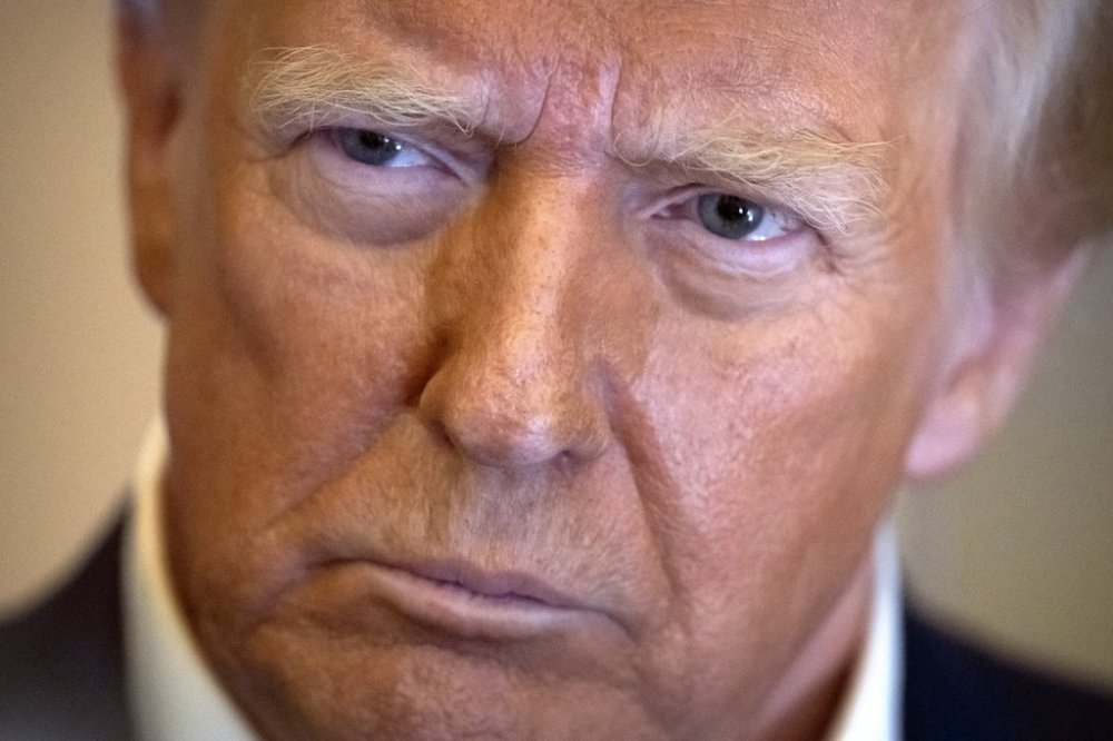 President Donald Trump speaks to reporters aboard Air Force One as he travels from Las Vegas to Miami on Saturday, Jan. 25, 2025. Canadian international trade lawyers say that if the U.S. goes ahead with steep tariffs on Saturday, Canada could strike back almost immediately. THE CANADIAN PRESS/AP/Mark Schiefelbein