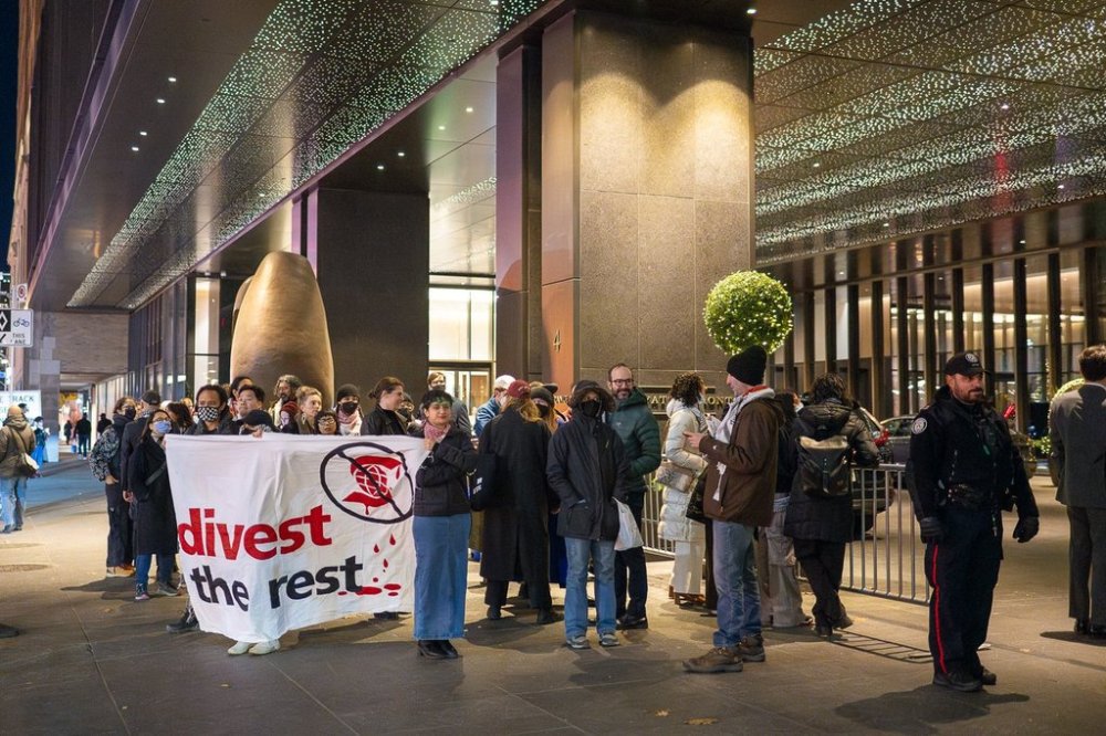 Demonstrators gather in front of a downtown Toronto hotel as the Giller Award ceremony was about to begin, chanting