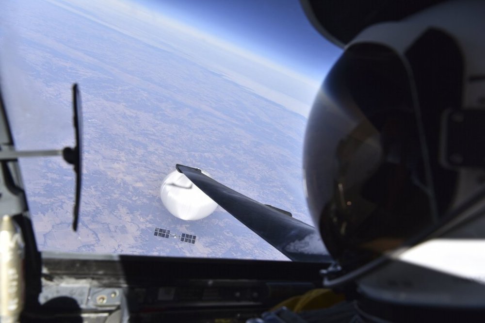 In this image released by the Department of Defense on Wednesday, Feb. 22, 2023, a U.S. Air Force U-2 pilot looks down at a suspected Chinese surveillance balloon as it hovers over the United States on Feb. 3, 2023. THE CANADIAN PRESS/AP-HO, DoD, *MANDATORY CREDIT*