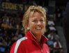 FILE - Solheim Cup assistant captain Dottie Pepper smiles at an NBA basketball game in Denver, Feb. 7, 2013. (AP Photo/David Zalubowski, File)