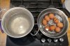 This photo provided by researchers in February 2025 shows two pots, one with boiling water, left, and the other with a basket of eggs in lukewarm water, in a new method of boiling eggs dubbed 