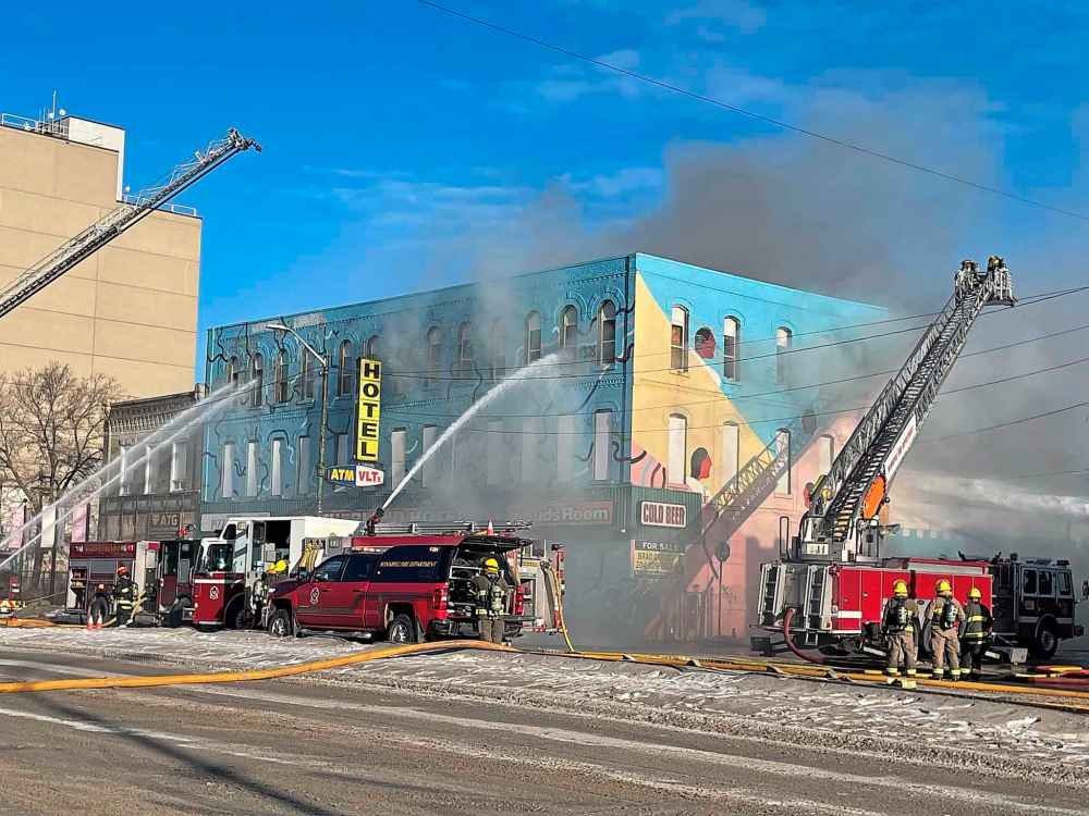 RUTH BONNEVILLE / FREE PRESS
A blaze at the boarded-up Sutherland Hotel on Main Street started sometime before 2 p.m.