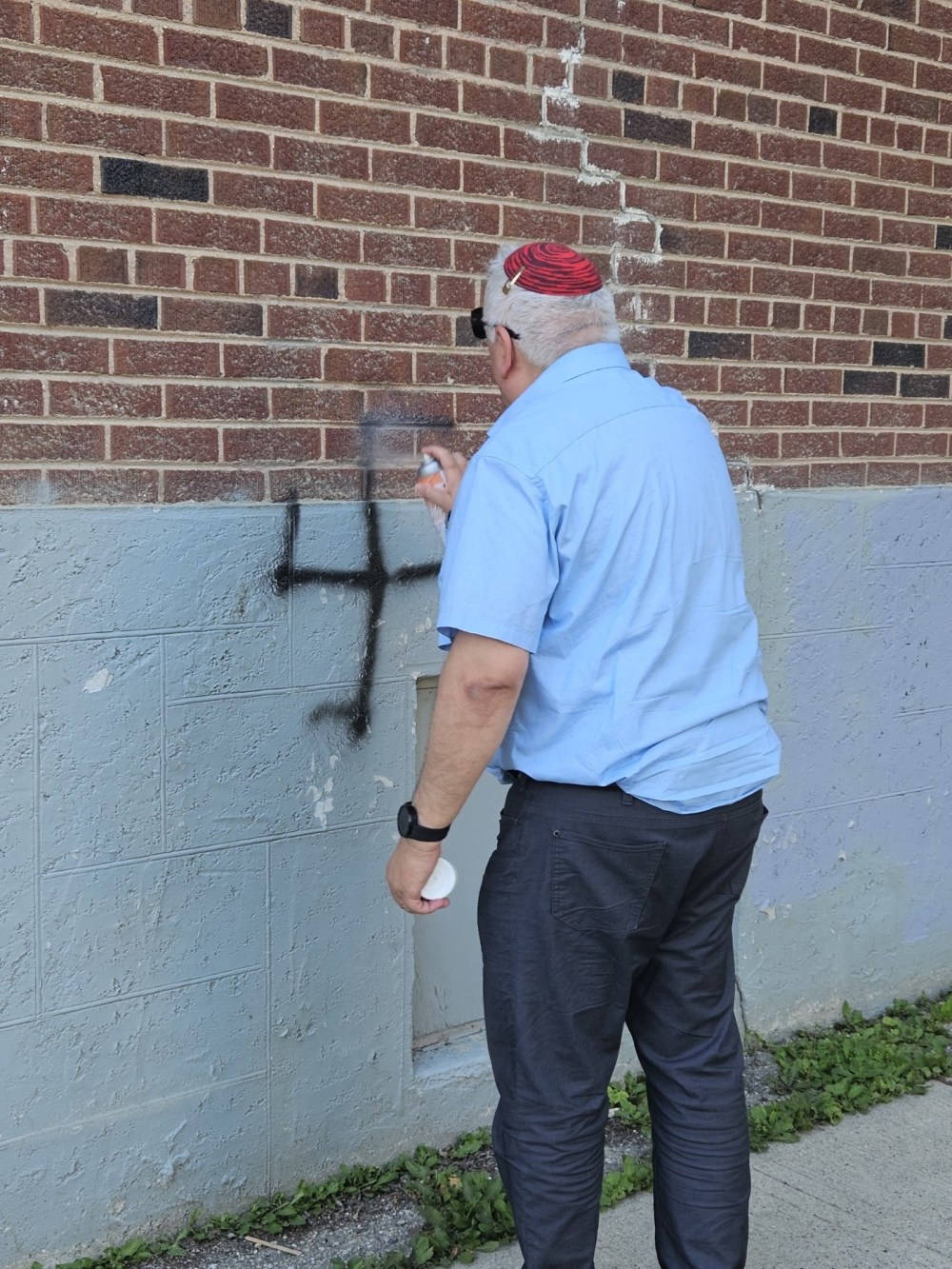 SUPPLIED
Avrom Charach has removed more than 100 graffiti symbols or messages, including a swastika on the wall of a Winnipeg synagogue.