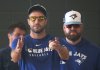 Toronto Blue Jays pitcher Max Scherzer, left, lines up on the pitching mound with Toronto Blue Jays manager John Schneider during spring training in Dunedin Fla., on Sunday, February 16, 2025. THE CANADIAN PRESS/Nathan Denette