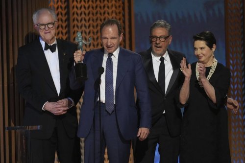 John Lithgow, from left, Ralph Fiennes, Sergio Castellitto, and Isabella Rossellini accepts the award for outstanding performance by a cast in a motion picture for 