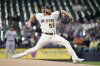 FILE - Milwaukee Brewers' Brandon Woodruff pitches during the first inning of a baseball game against the Miami Marlins, in Milwaukee, Sept. 11, 2023. (AP Photo/Aaron Gash, File)