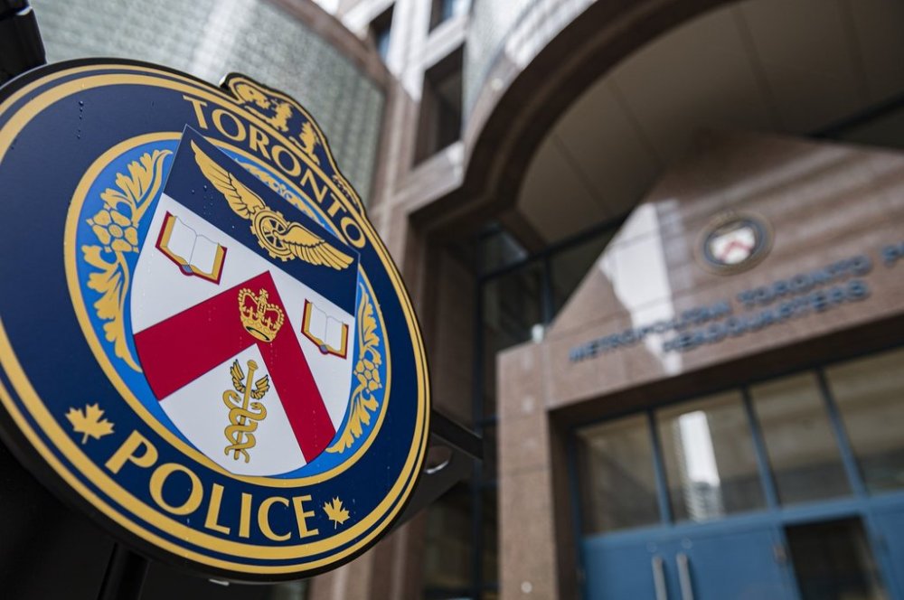 The Toronto Police Services emblem is photographed during a press conference at TPS headquarters, in Toronto, Tuesday, May 17, 2022. THE CANADIAN PRESS/Christopher Katsarov