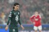 Monaco's Takumi Minamino reacts during a Champions League playoff second leg soccer match between SL Benfica and AS Monaco at the Luz stadium in Lisbon, Tuesday, Feb. 18, 2025. (AP Photo/Armando Franca)