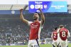 Arsenal's Mikel Merino celebrates after scoring his side's second goal during the English Premier League soccer match between Leicester City and Arsenal at King Power stadium in Leicester, England, Saturday, Feb. 15, 2025. (AP Photo/Rui Vieira)