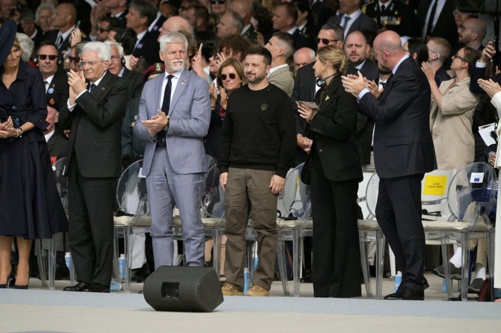 FILE - Ukraine President Volodymyr Zelenskyy, center, and other dignitaries, attend an international ceremony to mark the 80th anniversary of D-Day, Thursday, June 6, 2024, in Normandy. (AP Photo/Evan Vucci, File)