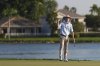 Joe Highsmith pumps his fist after finishing on the 18th green during the final round of the Cognizant Classic golf tournament, Sunday, March 2, 2025, in Palm Beach Gardens, Fla. (AP Photo/Rebecca Blackwell)