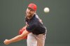 Atlanta Braves pitcher Chris Sale throws in the first inning of a spring training baseball game against the Minnesota Twins in Fort Myers, Fla., Saturday, Feb. 22, 2025. (AP Photo/Gerald Herbert)