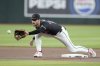 FILE - Arizona Diamondbacks second baseman Blaze Alexander warms up prior to a baseball game against the Colorado Rockies, Wednesday, Aug. 14, 2024, in Phoenix. (AP Photo/Ross D. Franklin, File)