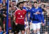 Manchester United's Bruno Fernandes celebrates scoring his side's first goal, during the English Premier League soccer match between Everton and Manchester United, at Goodison Park, in Liverpool, England, Saturday, Feb. 22, 2025. (Peter Byrne/PA via AP)