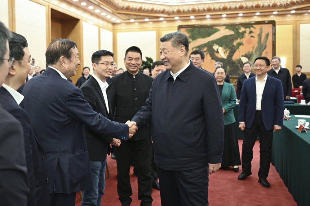 In this photo released by Xinhua News Agency, Chinese President Xi Jinping meets with representatives of private entrepreneurs in Beijing on Monday, Feb. 17, 2025.(Li Xueren/Xinhua via AP)