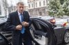 FILE - Romania's President Klaus Iohannis arrives in the symposium 