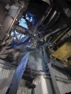 In this photo provided by the Ukrainian Emergency Service, damaged sarcophagus that covers the destroyed 4th reactor of Chernobyl nuclear power plant is seen from inside following a Russian drone attack in Chernobyl, Ukraine, Friday, Feb. 14, 2025. (Ukrainian Emergency Service via AP)
