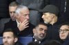 England coach Thomas Tuchel, right, and France coach Didier Deschamps chat on the stands before a Champions League opening phase soccer match between Paris Saint-Germain and Manchester City at the Parc des Princes in Paris, Wednesday, Jan. 22, 2025. (AP Photo/Thibault Camus)