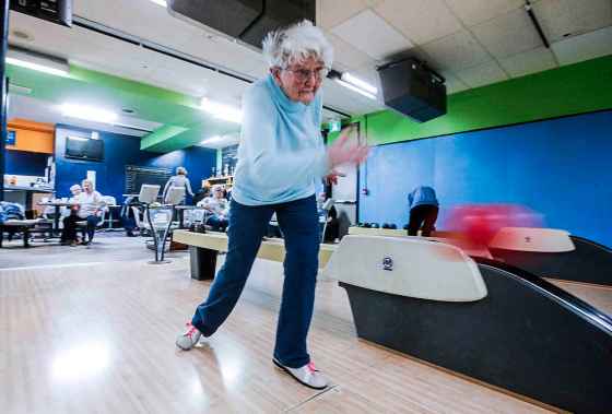 May Hampel, 88, goes for a strike as members of the Kelvin Ladies league bowl at Billy Mosienko Lanes. (John Woods / Free Press)