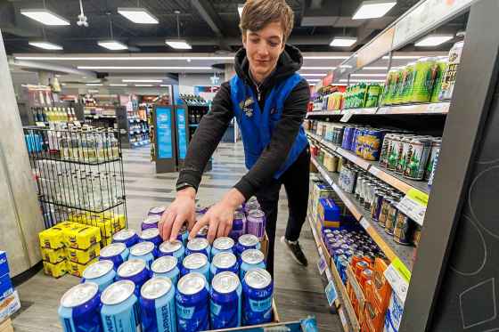 Collin Jolicoeur-Mackenzie, a customer service clerk at the Madison Square Liquor Mart, is on his second three month work experience rotation. (Mike Deal / Free Press)