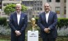 FILE - FIFA President Gianni Infantino,, left, and Vice President Vittorio Montagliani stand with the FIFA World Cup trophy Thursday, June 16, 2022, in New York. (AP Photo/Noah K. Murray, File)